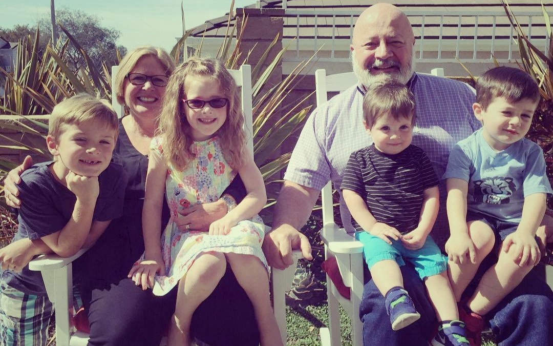 Ray Waters with Wife & Grand Children